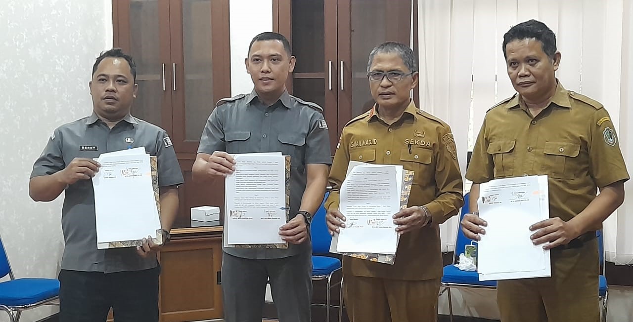 Bawaslu Kota Gorontalo Menandatangani Berita Acara Serah Terima Pinjam Pakai Gedung Taman Kren Dengan Pemerintah Kota Gorontalo